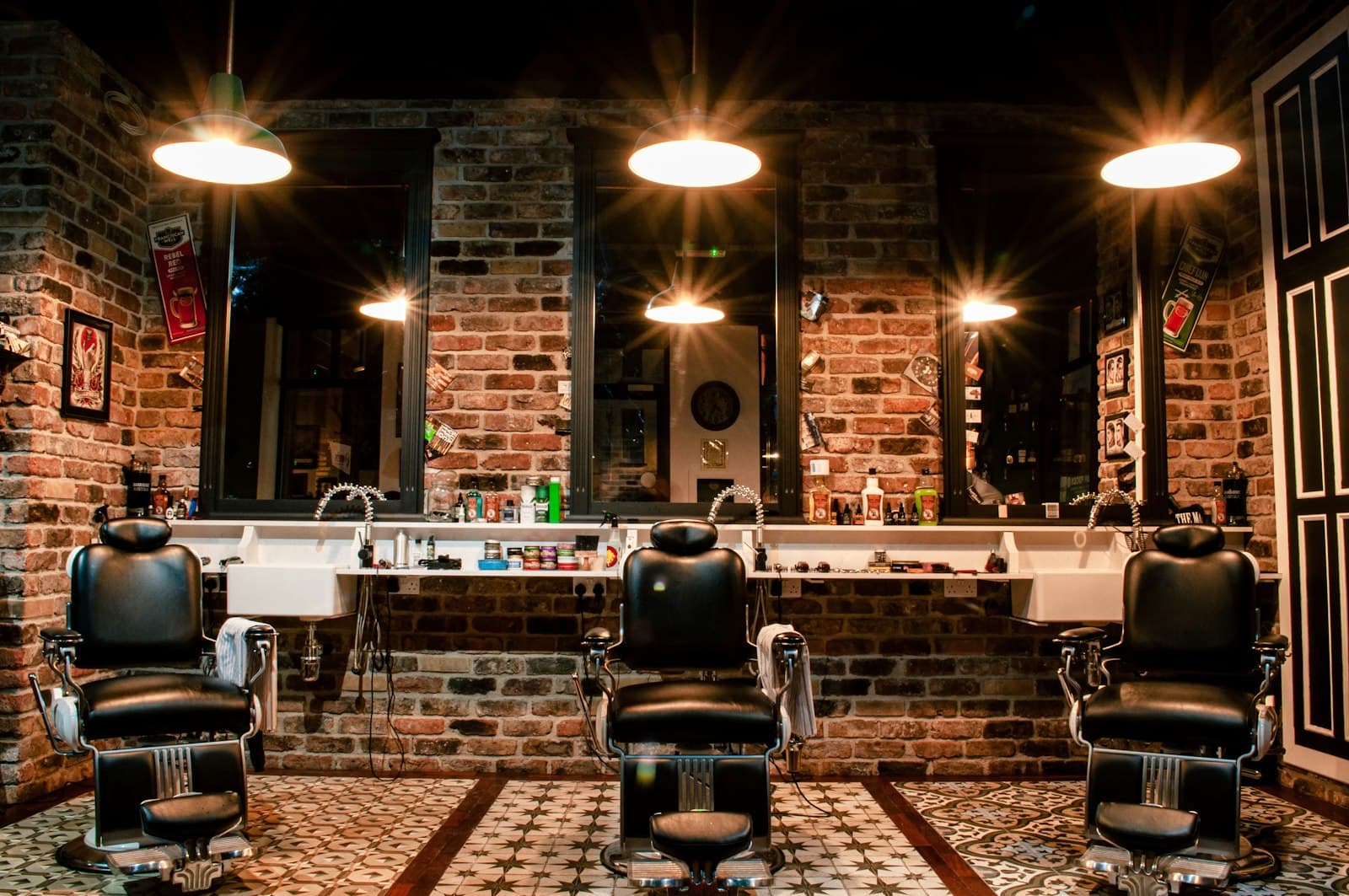 A barber cutting hair in an independent shop
